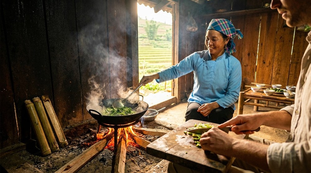 Lunch being cooked over a wood fire in a Giay family kitchen in Ta Van